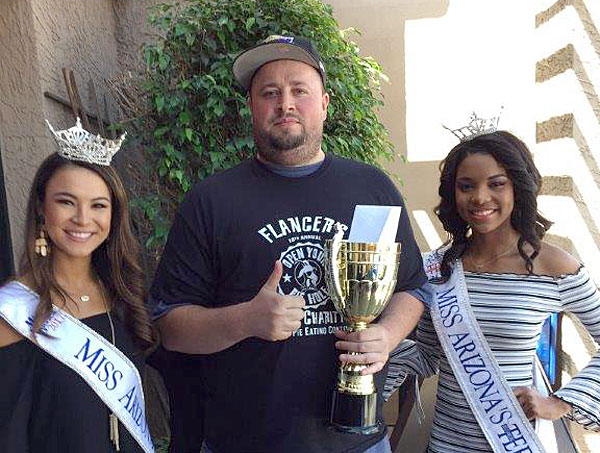 Post image for Phoenix man successfully defends crown at Flancer’s annual pizza-eating contest